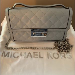 Michael Kors leather quilted Clutch & Chain Bag